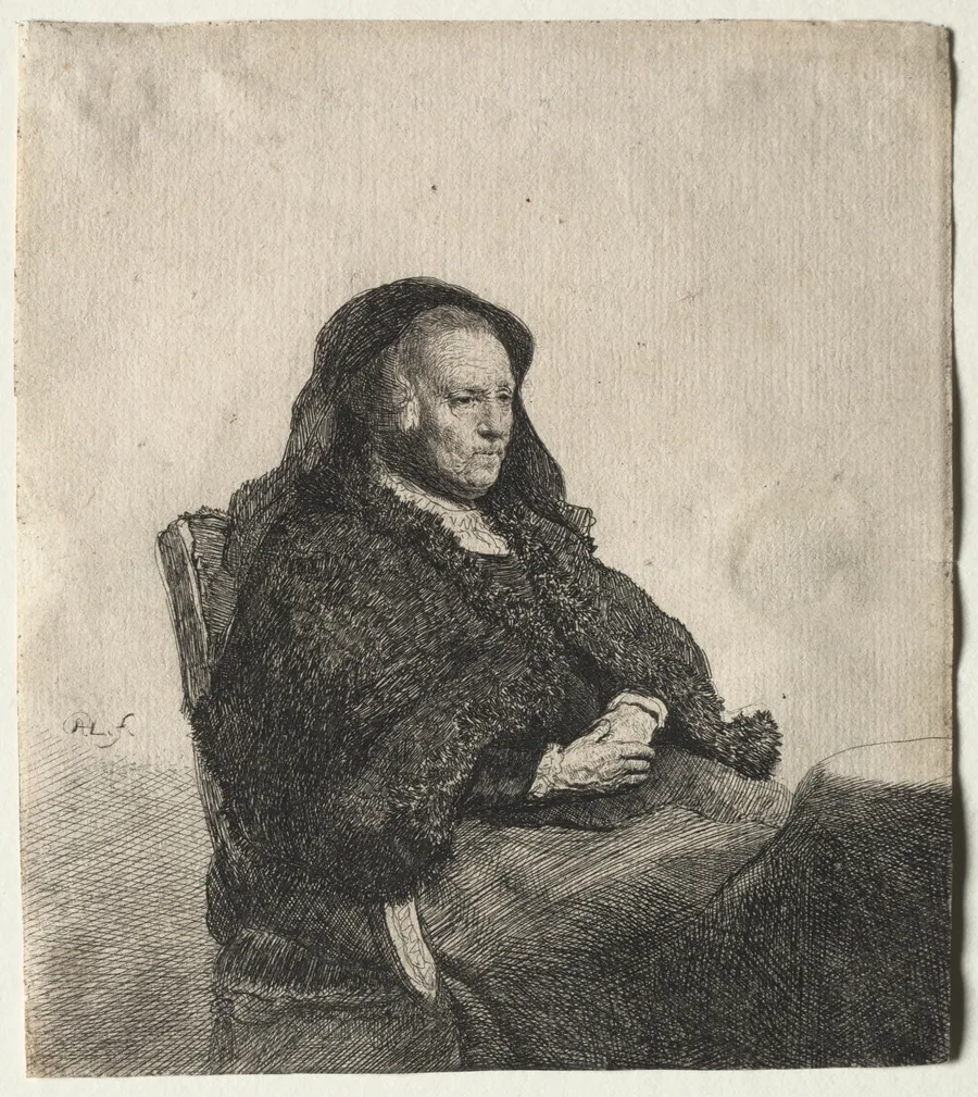 The Artist's Mother Seated at a Table, Looking Right: Three Quarter Length by Rembrandt van Rijn