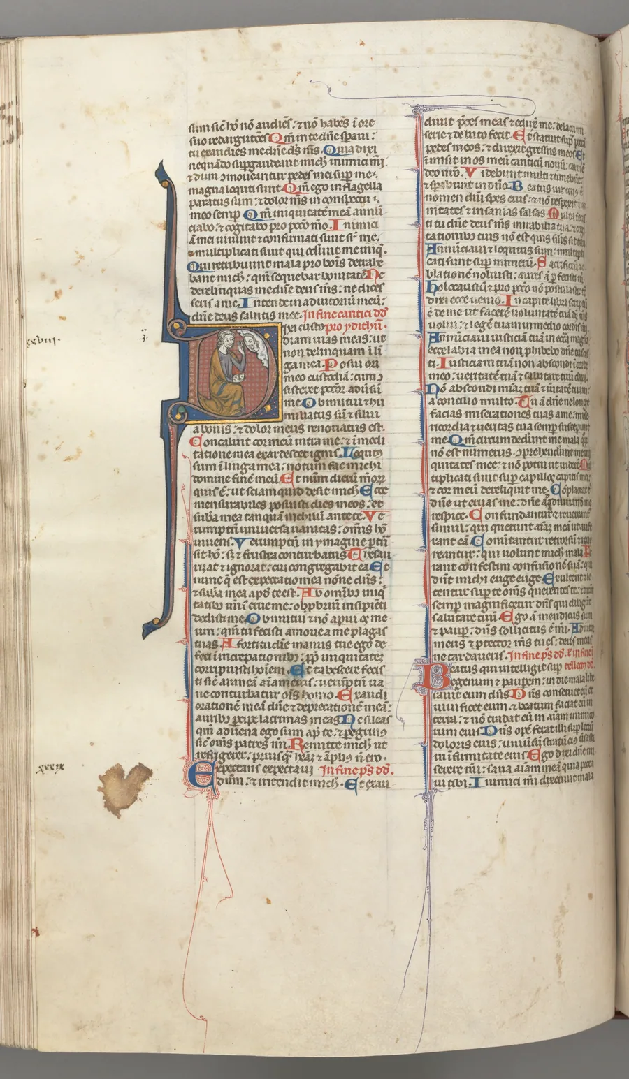 Fol. 220v, Psalm 38, historiated initial D, David kneeling, gesturing to the bust of God above