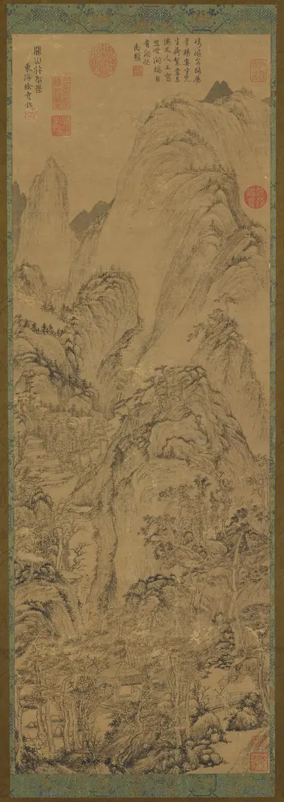 Mountain gorge: houses and a stream in the valley