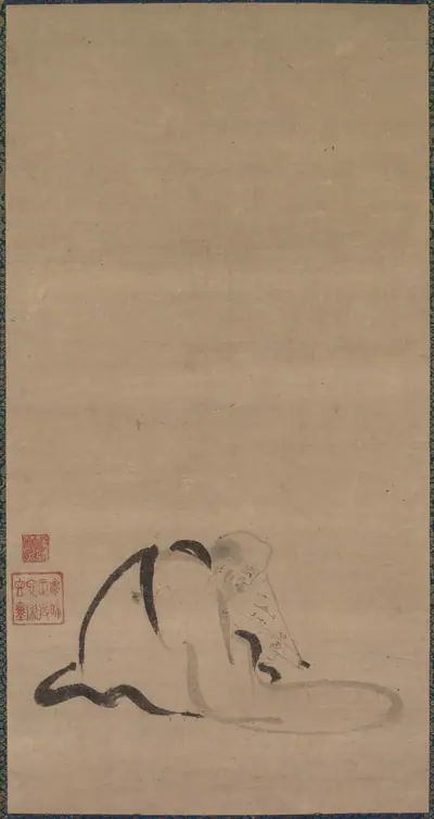 Seated Priest
