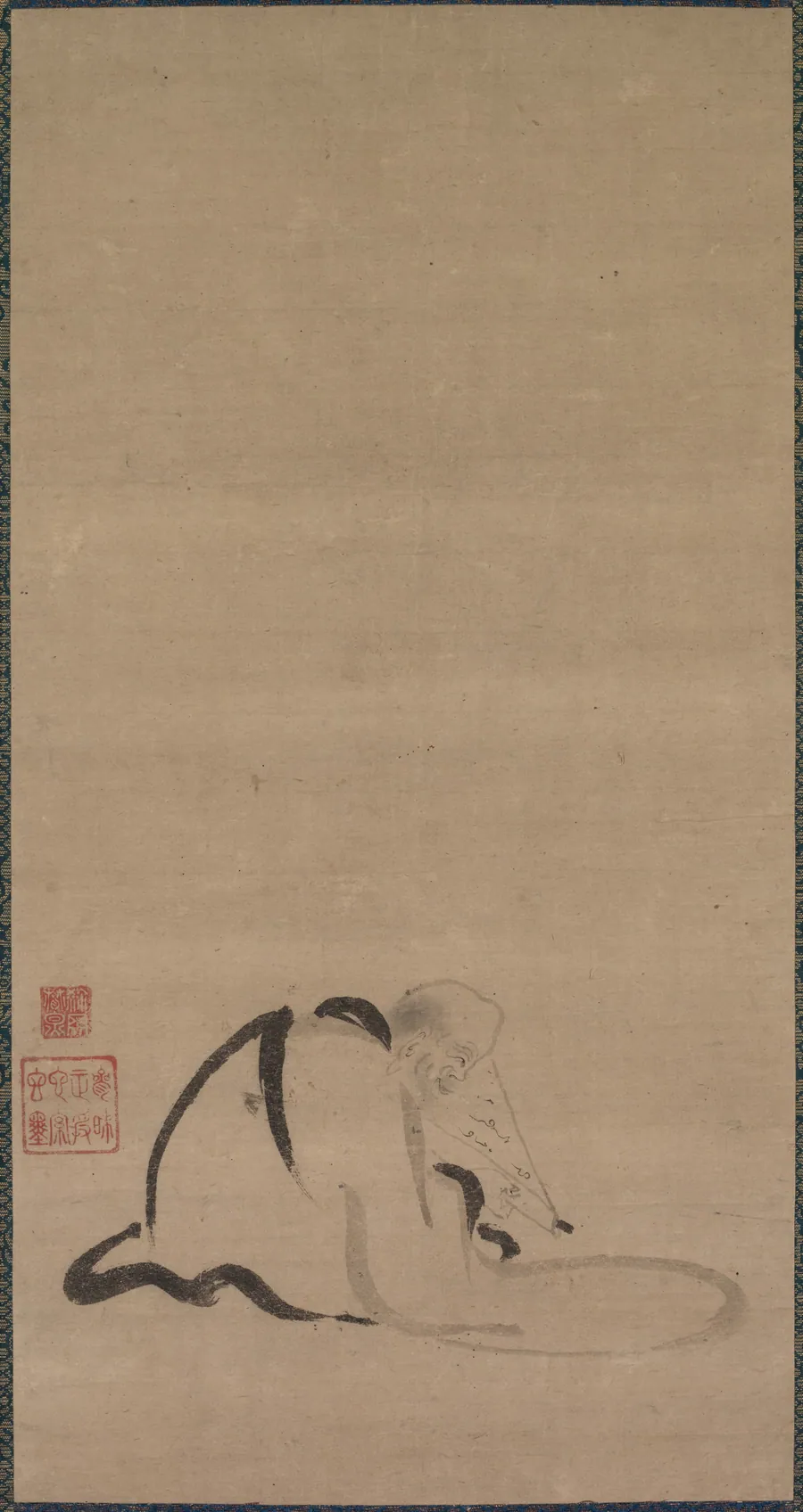 Seated Priest