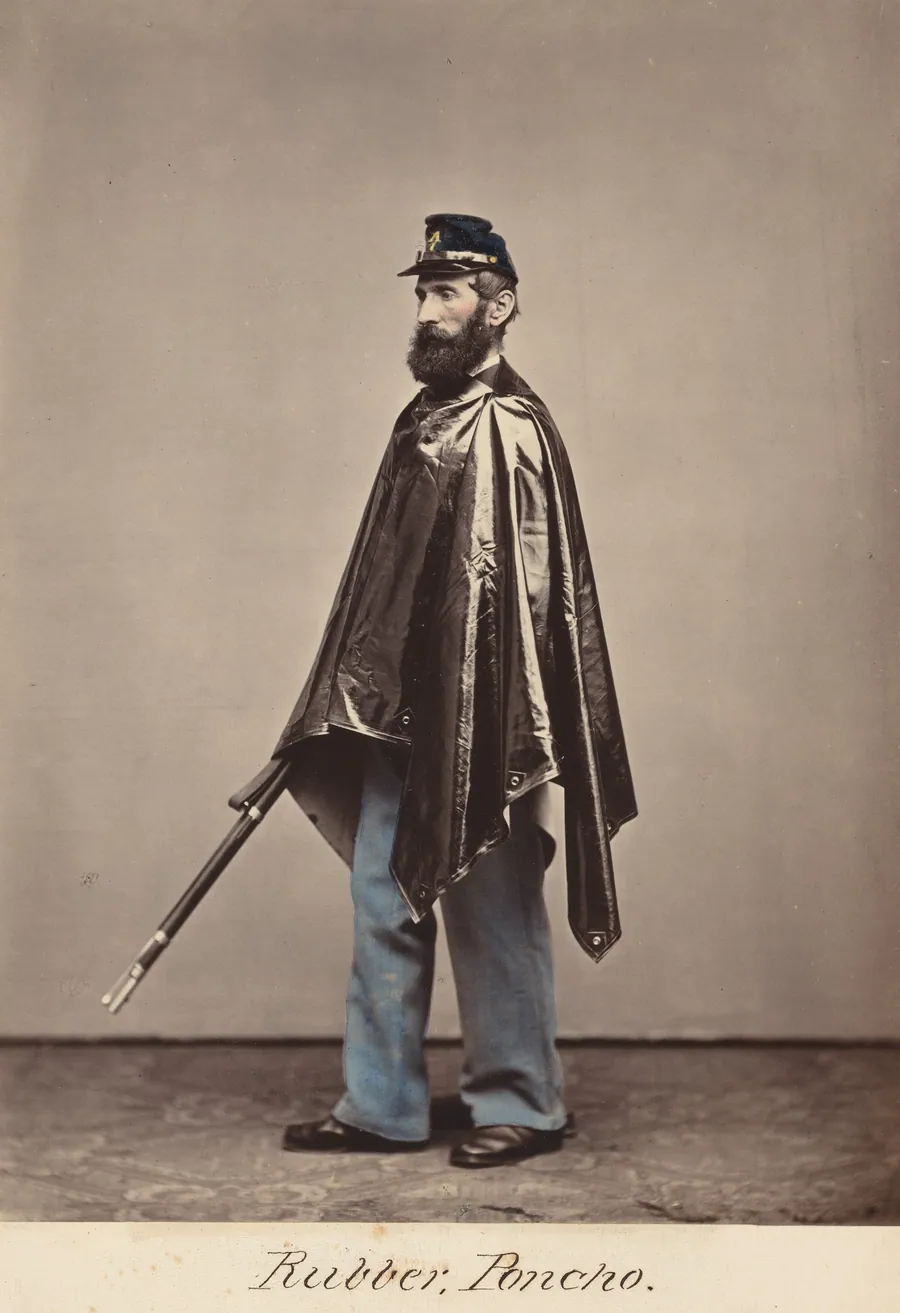 Rubber Poncho by Oliver H. Willard