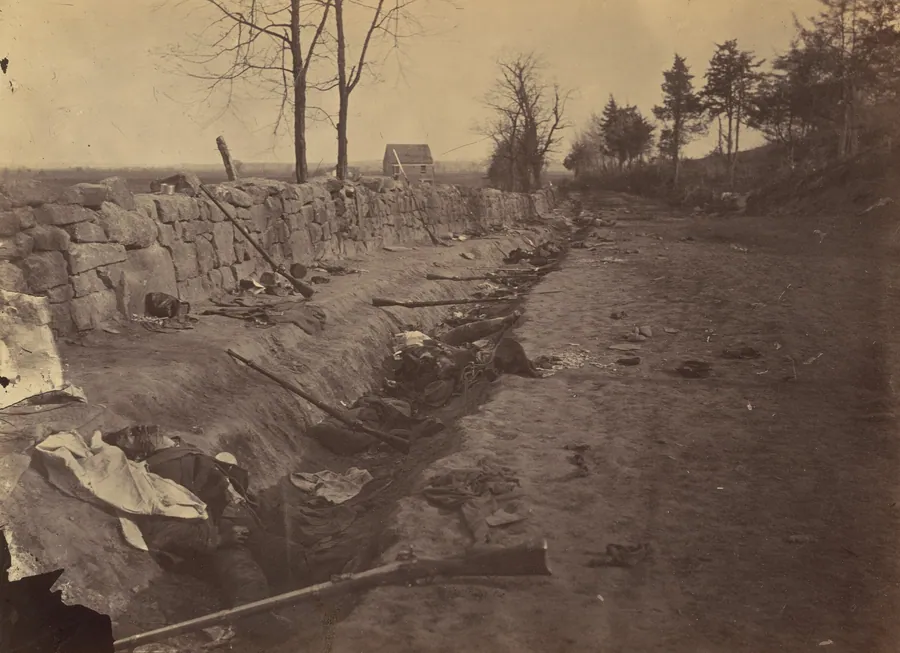 Stone Wall, Rear of Fredericksburg, with Rebel Dead by Andrew Joseph Russell