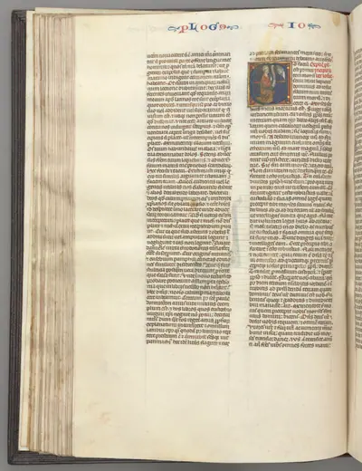 Fol. 76v, Joshua, historiated initial E, Joshua with a scroll kneeling before God