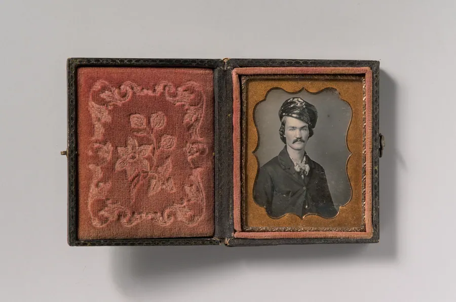 [Man with Mustache Wearing Oilskin Hat] by Edward M. Tyler
