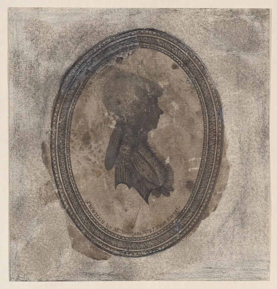 Silhouette of a young woman facing right in an oval frame by Isabella Beetham