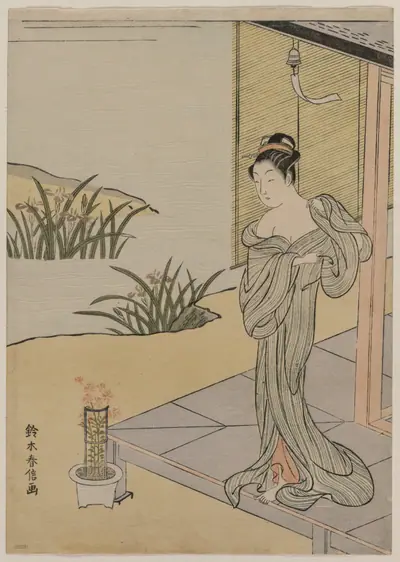 Young Woman Looking at a Pot of Pinks