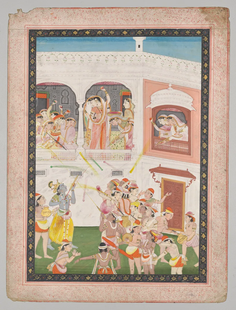 Radha and Hindu God Krishna celebrating the festival Holi
