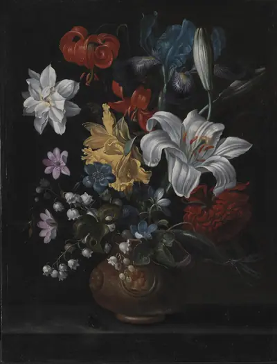 En stentøjskrukke med blomster