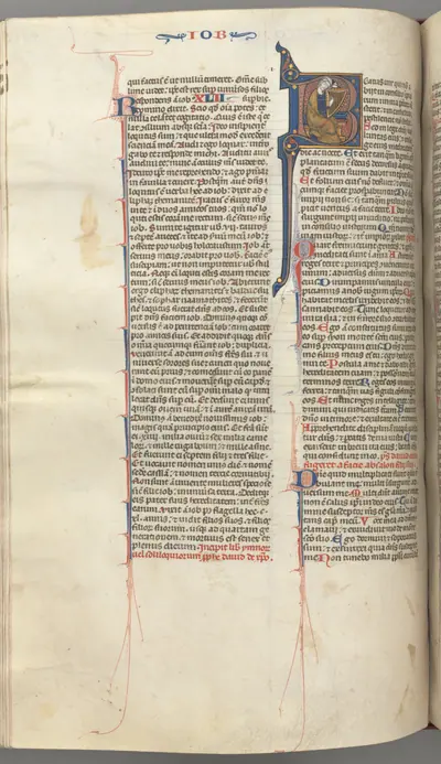 Fol. 214v, Psalm 1, historiated initial 8, David harping