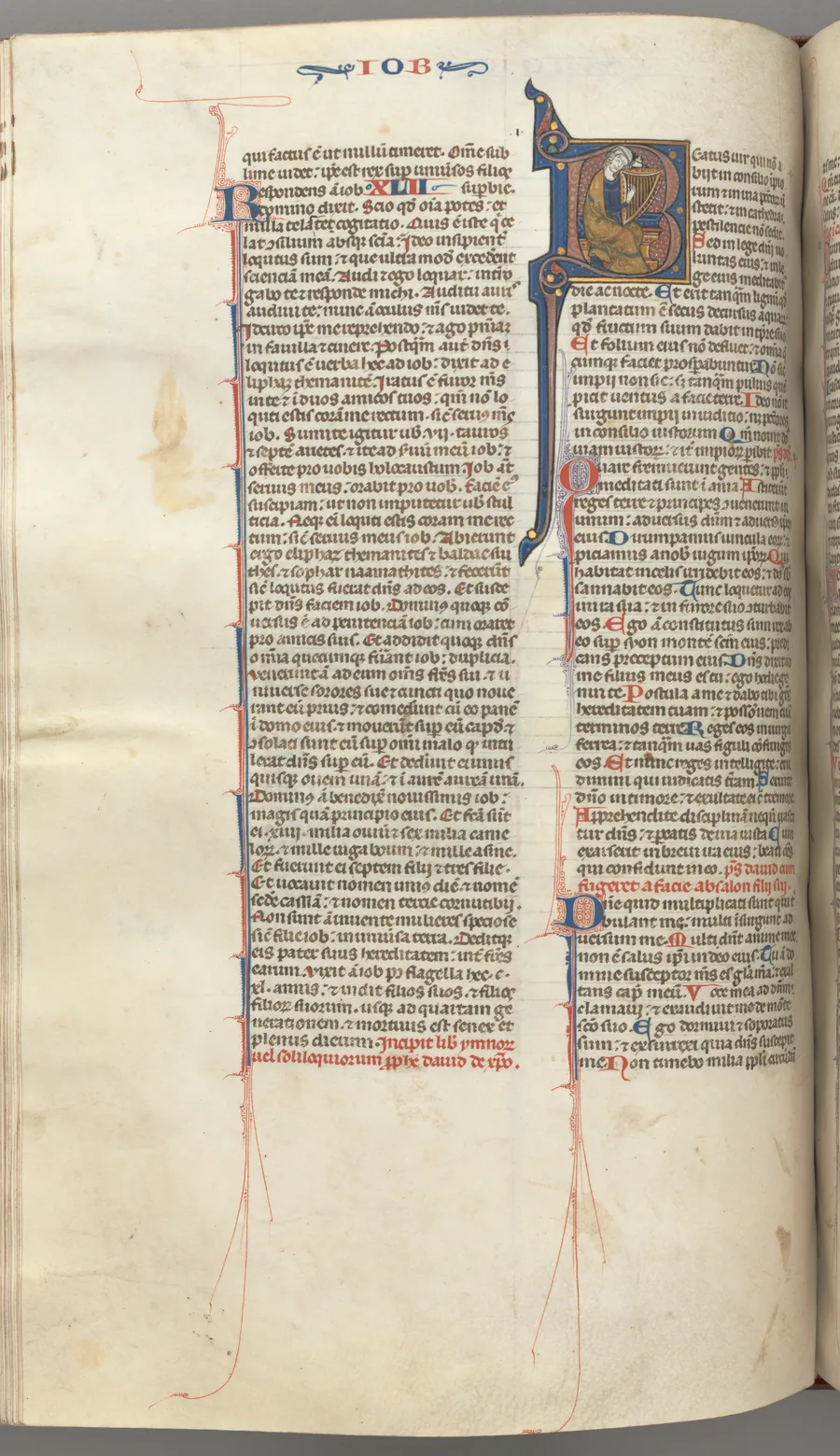 Fol. 214v, Psalm 1, historiated initial 8, David harping