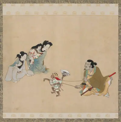 Monkey trainer and monkey performing a dance