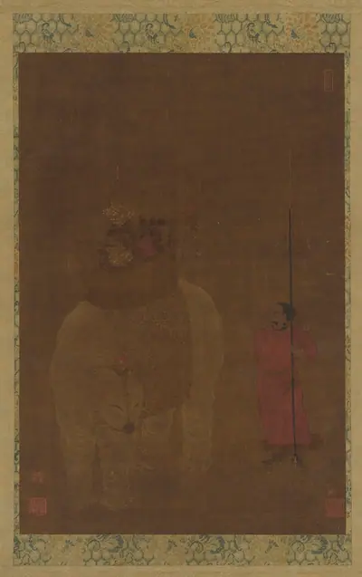 Caparisoned elephant and attendant