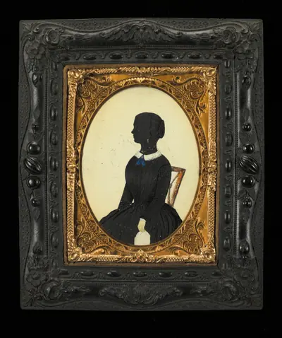 Silhouette of a Seated Woman