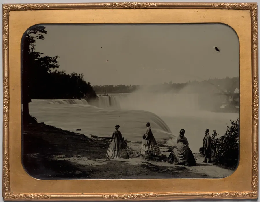 Niagara Falls with well-dressed group by Platt D. Babbitt