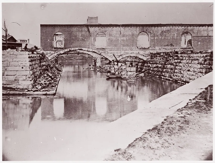 [Canal and Ruins of Richmond and Danville Railroad Depot, Richmond, Virginia] by Alexander Gardner