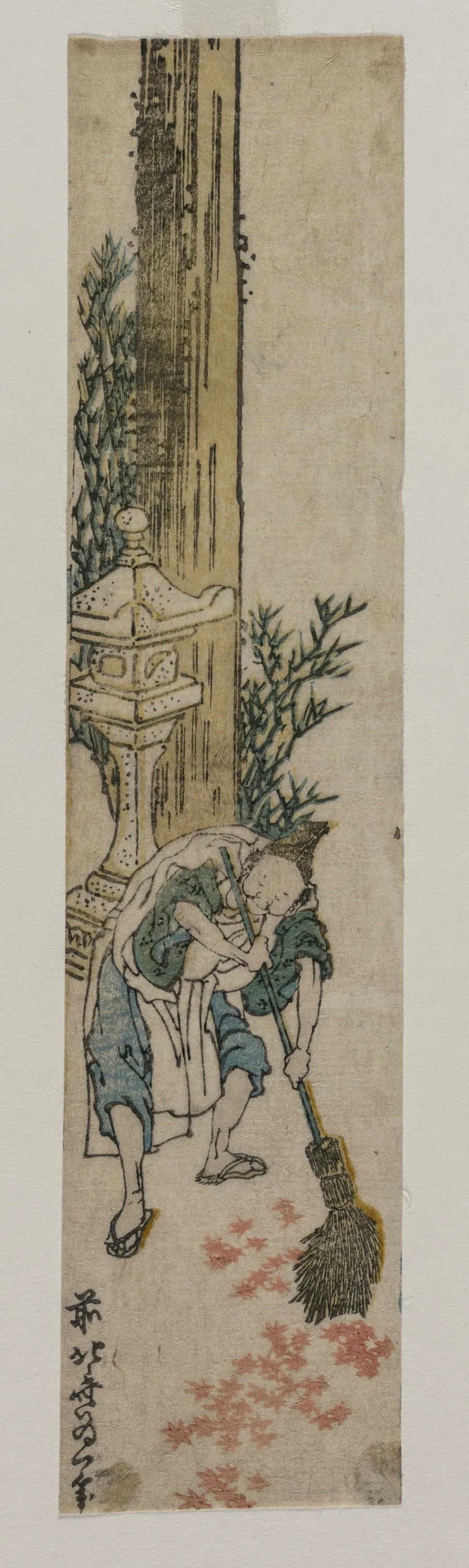 Shrine Attendant Raking Maple Leaves by Katsushika Hokusai