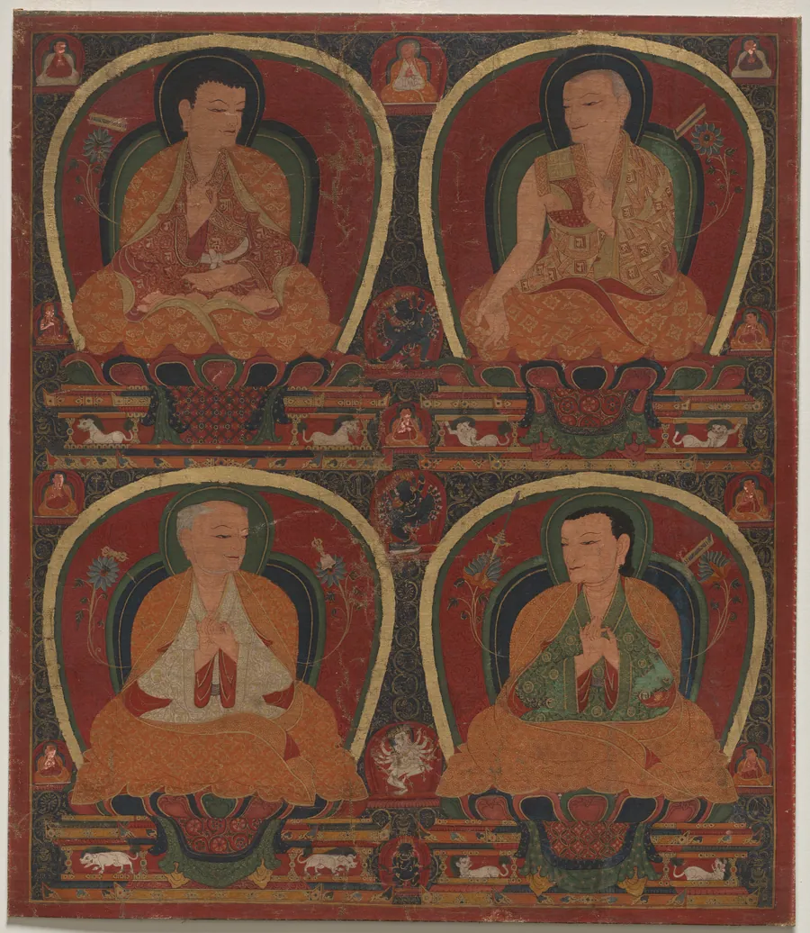 Four seated Masters