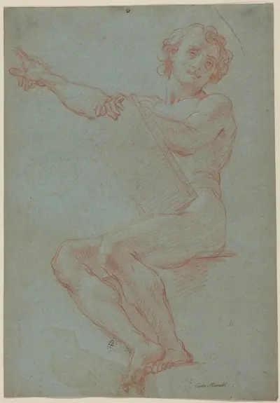 A Seated Man Holding a Tablet