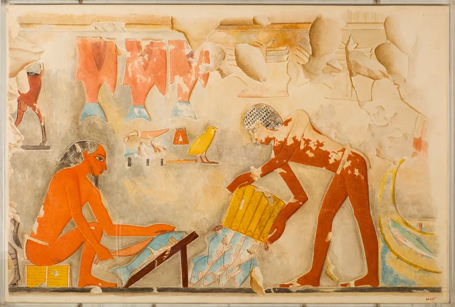 Men Preparing Fish by Hugh R. Hopgood