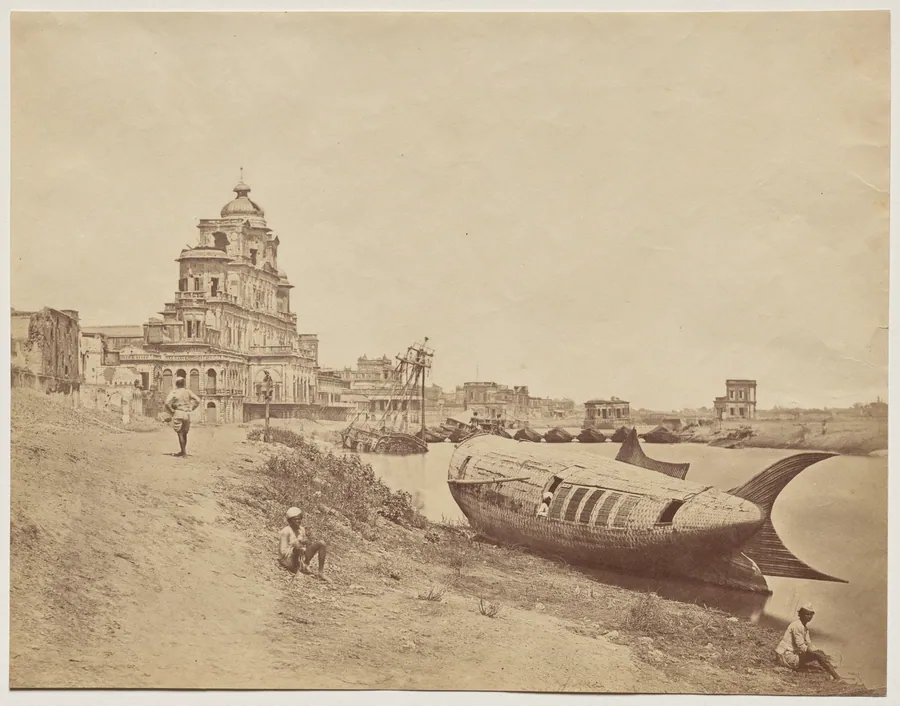 Chutter Manzil Palace, with the King's Boat in the Shape of a Fish by Felice A. Beato