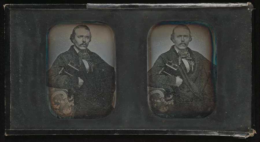 [Stereoscopic Portrait of Man Holding Stereoscopic Viewer] by Franz Friedrich