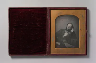 [Seated Middle-aged Man in Bow Tie and Jacket]