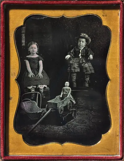 Two Children with Toys