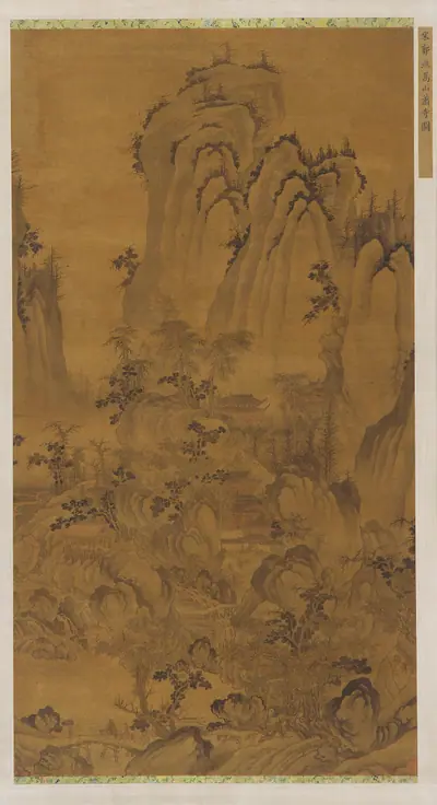 Landscape: a mountain gorge, a stream, buildings and people