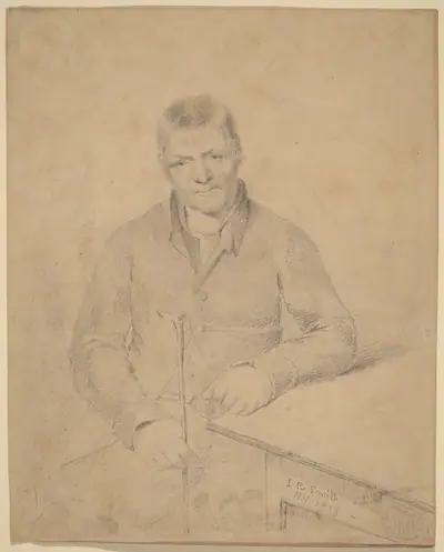 Man Seated at a Table