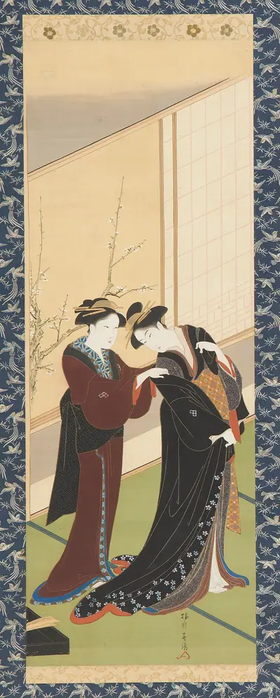 Interior: a woman helping a girl to dress