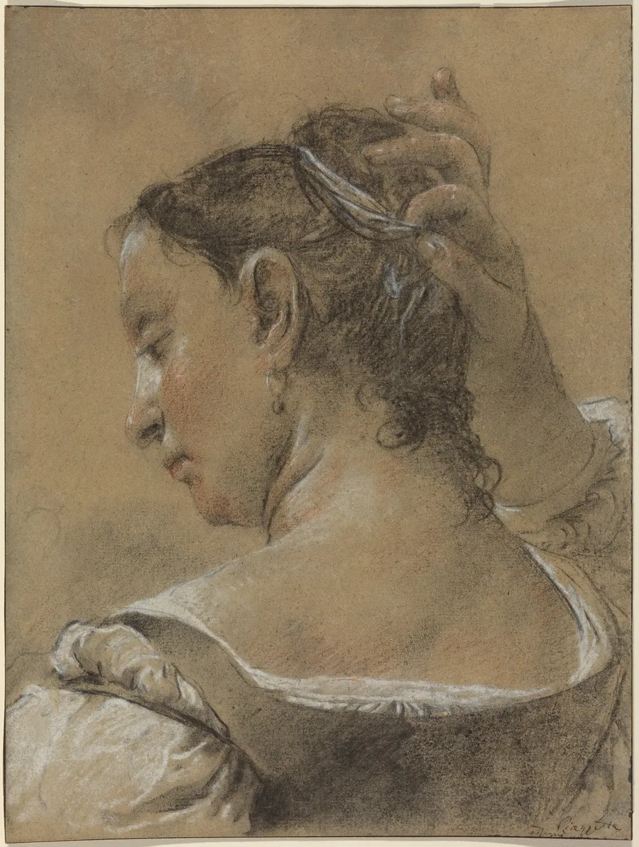 A Young Woman Fixing Her Hair by Domenico Maggiotto