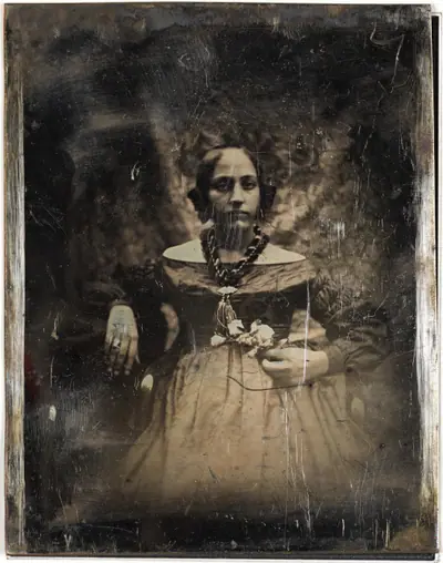 [Young Woman Holding a Flower]