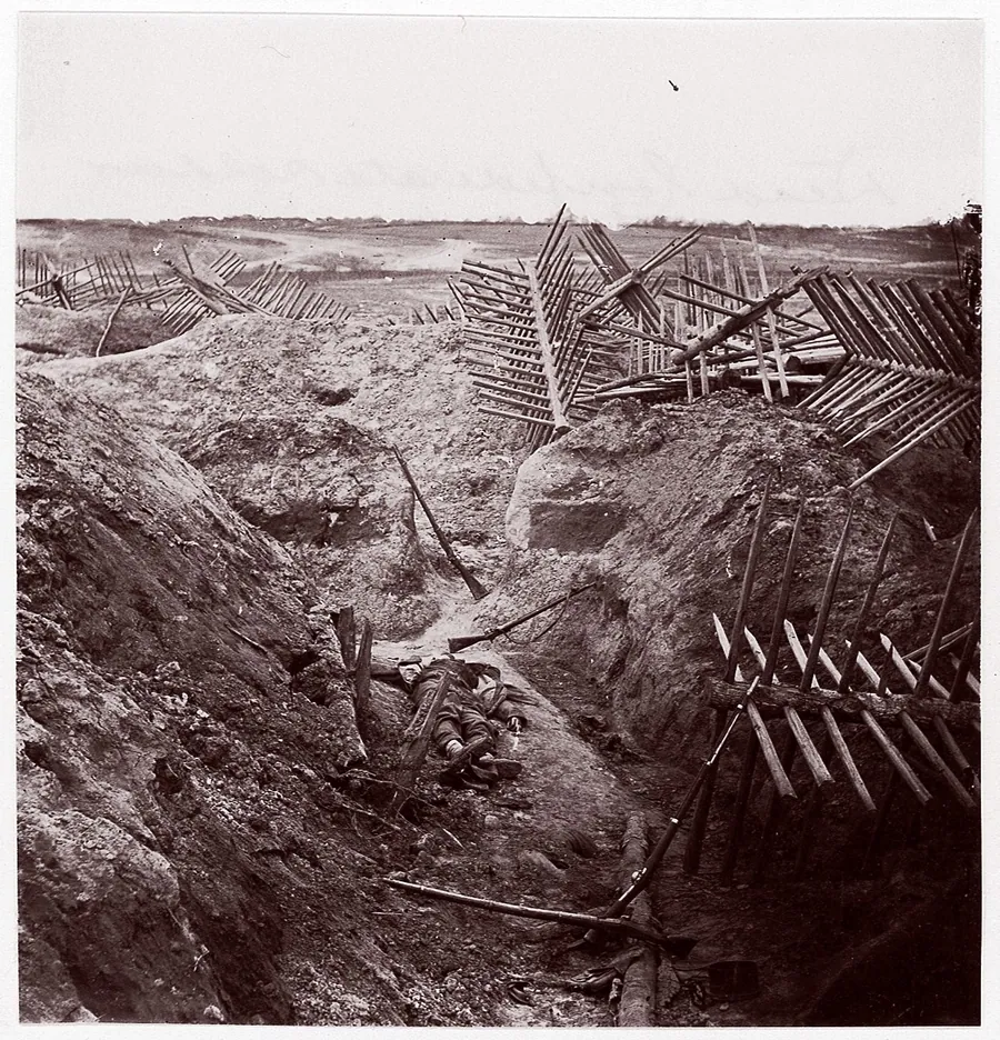 [Dead Confederate Soldier in the Trenches of Fort Mahone, Petersburg, Virginia] by Thomas C. Roche