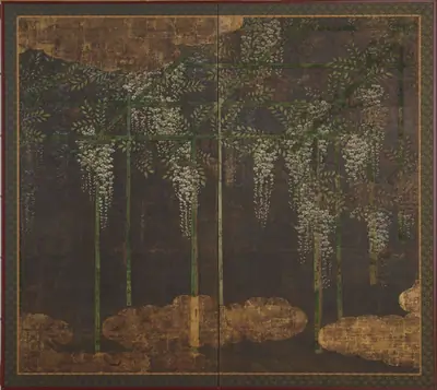 Blossoming wisteria on a bamboo trellis