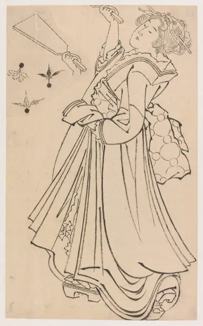 Girl playing with a battledore and shuttlecock