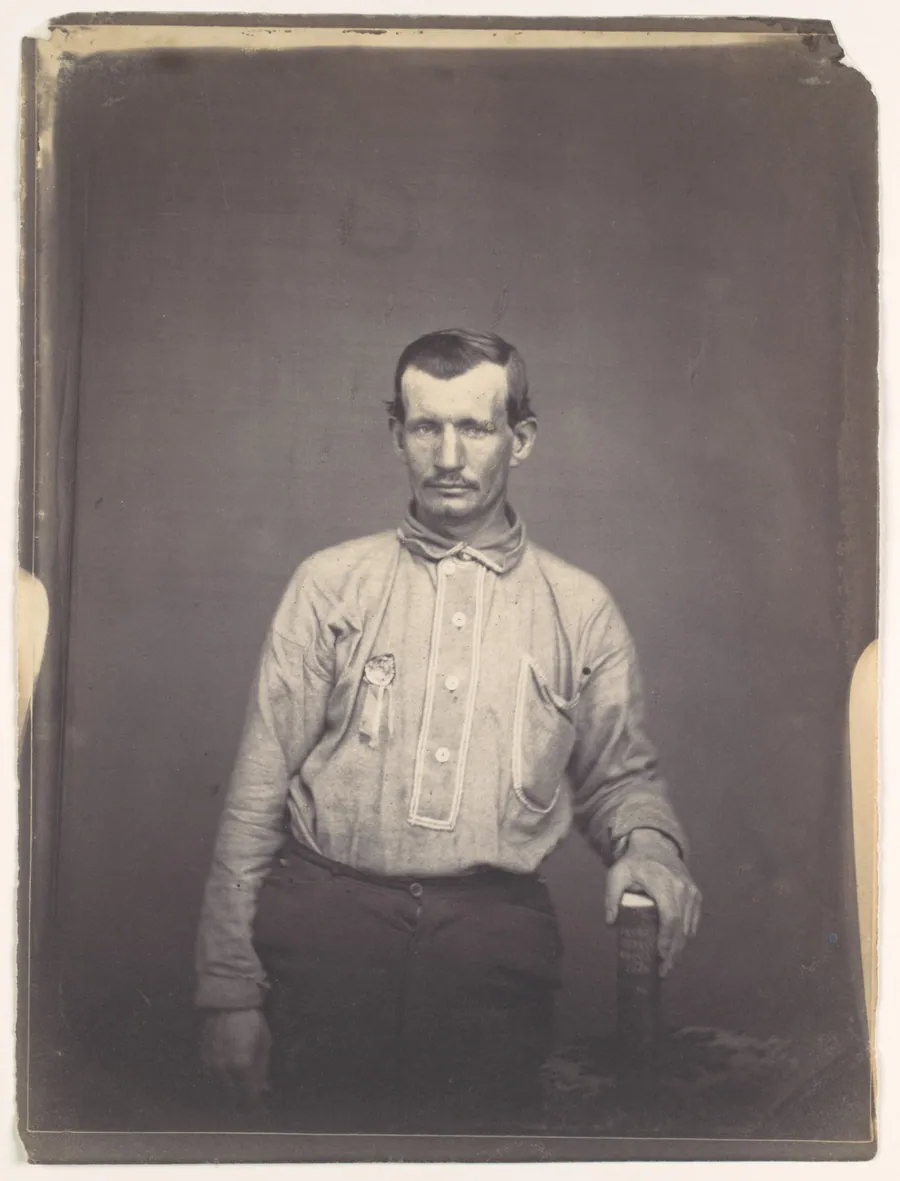 [Man Holding Patent Office Book] by Oliver H. Willard