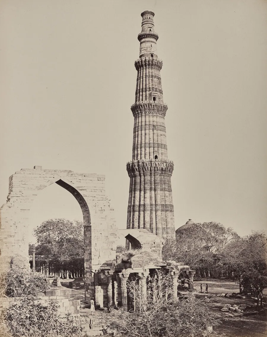 Delhi. The Kootub Minar or Tower in the Ruined City of Old Delhi by Samuel Bourne