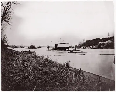 Ironclad fleet on James River below Rebel "Howlett House Battery"