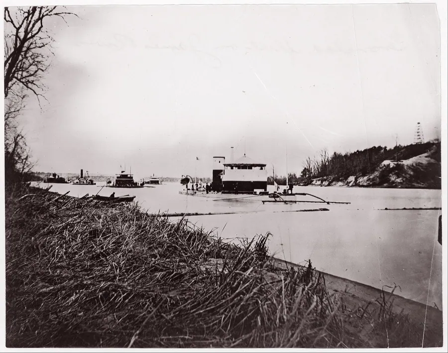 Ironclad fleet on James River below Rebel "Howlett House Battery" by Mathew B. Brady