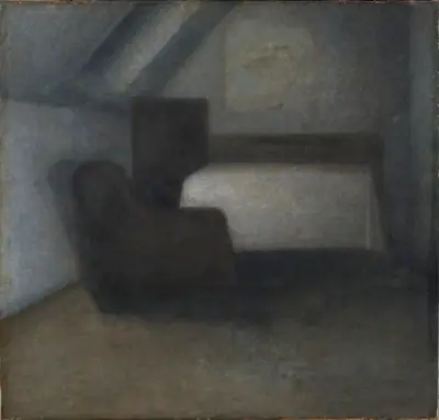 Loftværelse med bord og stol