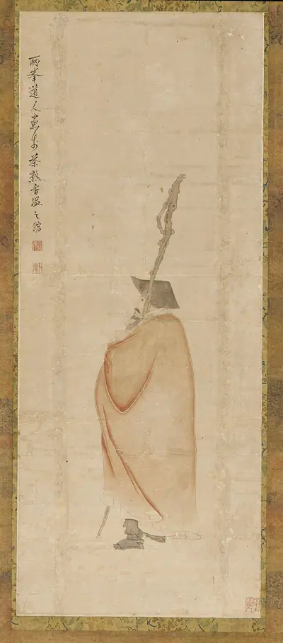 Standing man in a red coat