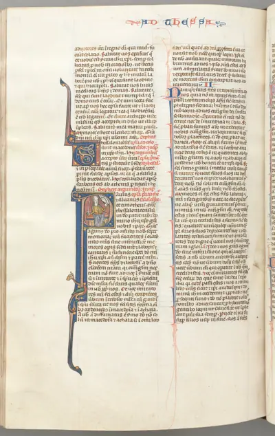 Fol. 454v,Thessalonians I, historiated initial P, Paul seated with a sword and a book, talking to the bust of God above