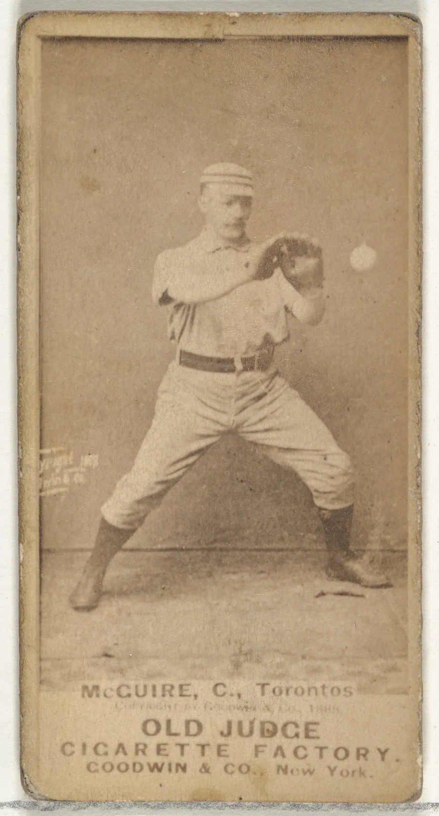 James Thomas "Deacon" McGuire, Catcher, Toronto Canucks, from the Old Judge series (N172) for Old Judge Cigarettes by Goodwin & Company
