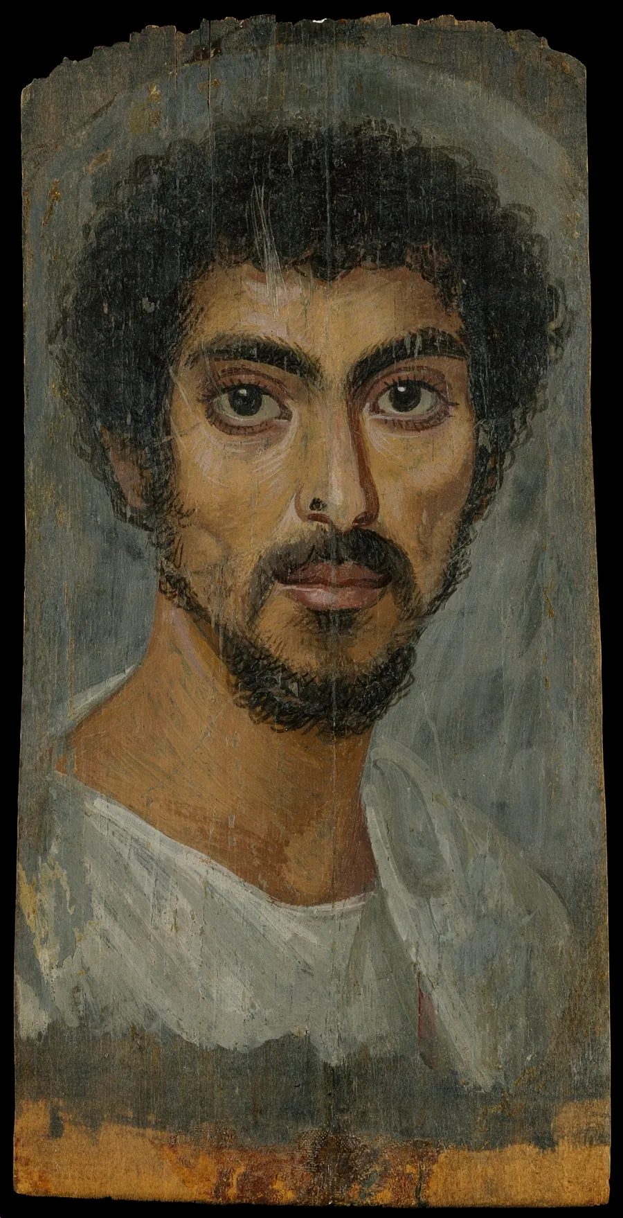 Portrait of a man with a mole on his nose