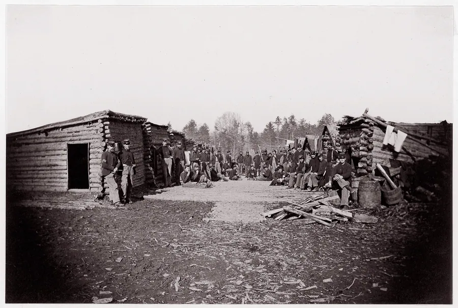 [Winter Quarters, troops with row of cabins].  Brady album, p. 128 by Mathew B. Brady