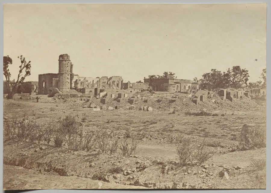 The Churchyard and Residency in the Distance by Felice A. Beato